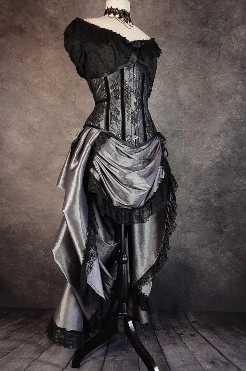 dark shot silver taffeta victorian style bustle skirt with matching black lace covered australian made steel boned corset shown on a mannequin