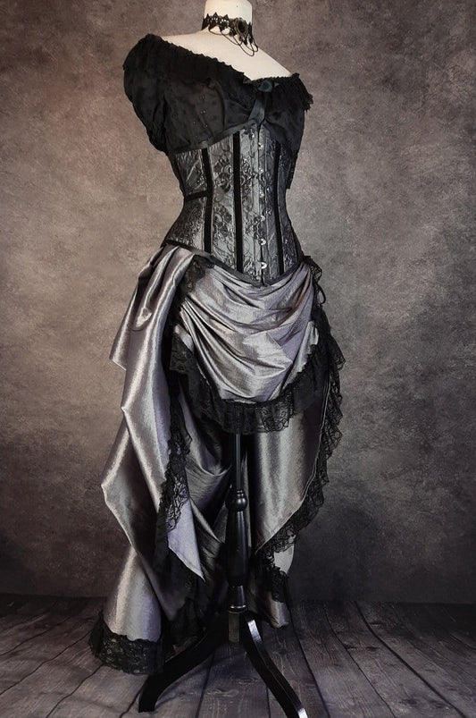 Dark shot silver taffeta victorian style bustle skirt high low style worn with a matching Silver Pandora corset