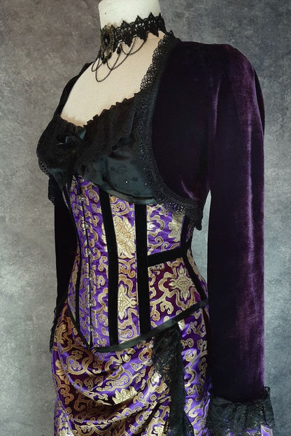 purple stretch velvet Bolero Shrug, black lace trim at hem and sleeves to be worn with a corset to show off the waist