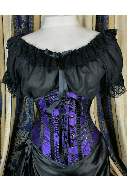 front view of the black cotton cheesecloth Alice in Wonderland chemise trimmed with black lace and black ribbon available in plus size