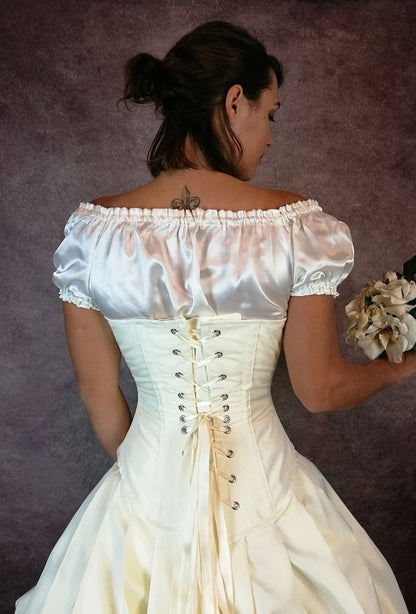 back view of the ivory satin chemise worn beneath the Ivory Majestica wedding corset by Gallery Serpentine