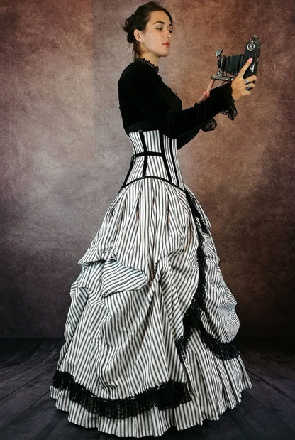 model wearing a black velvet bolero over the Victorian Picnic Gown