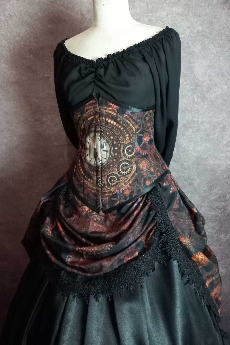 close up of the clockface and gears of the steel boned australian made to measure corset