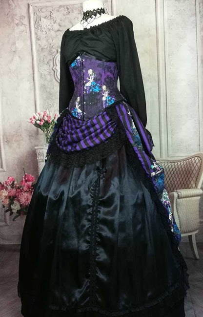 purple and black striped victorian bustle skirt featuring the characters from Alice in Wonderland, for wearing with a corset, made in Australia, shown with the matching corset and worn over a boned petticoat, front view