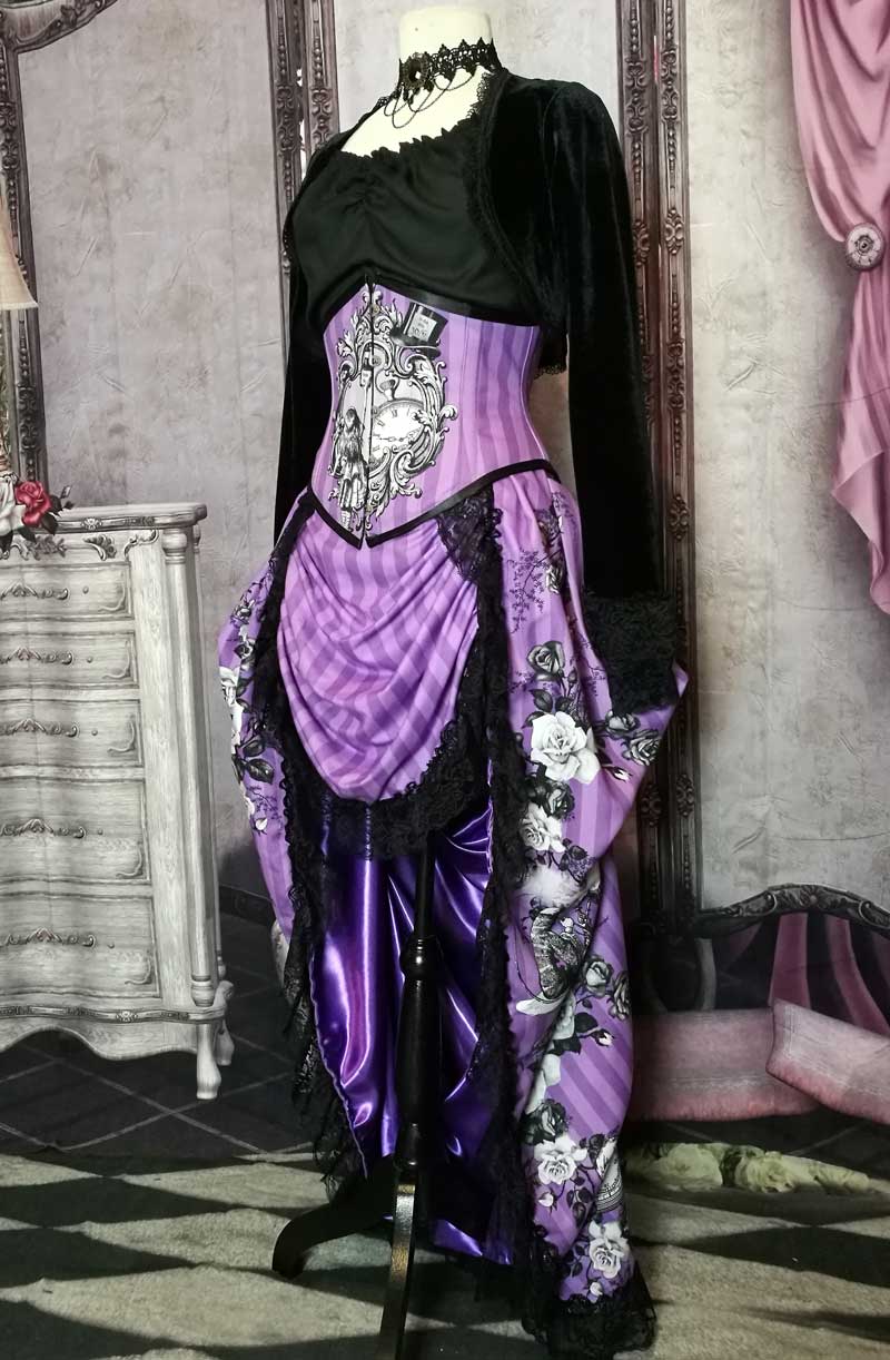 alternate side view of the Violet coloured custom printed and made Alice in Wonderland fabric made into a steel boned under bust corset and matching  Victorian high low bustle skirt