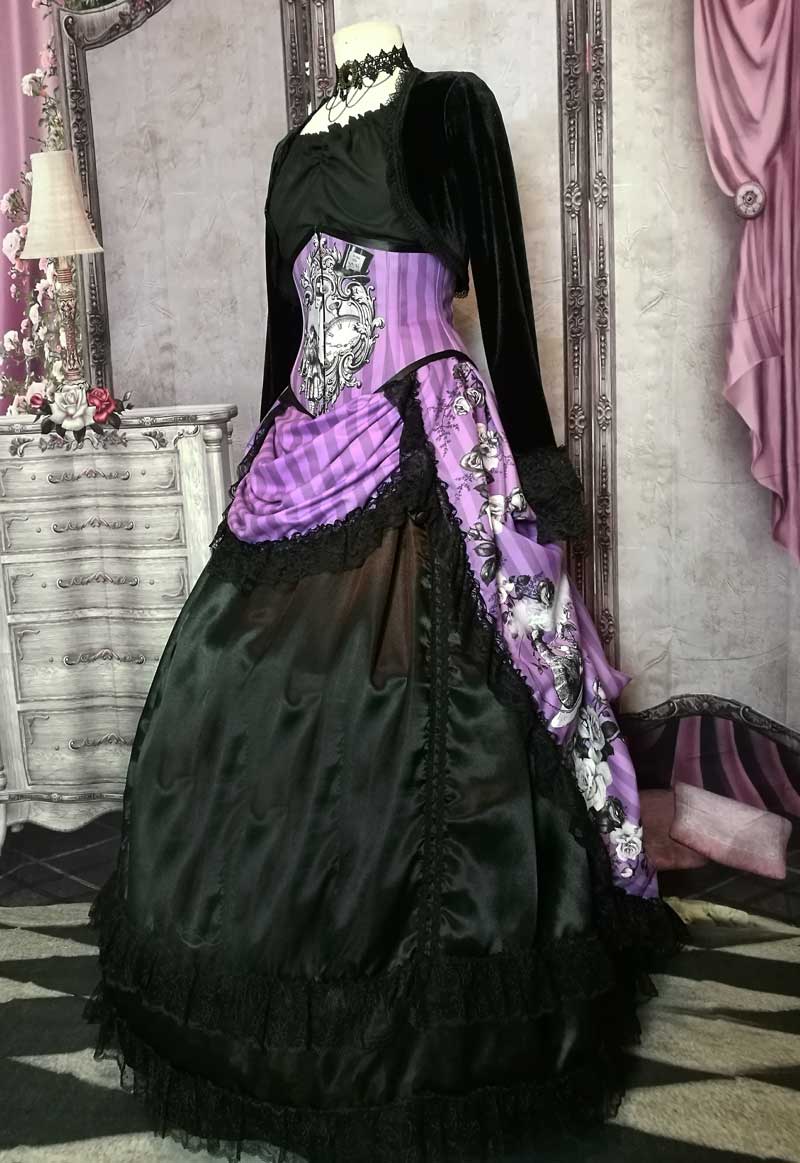 side front view of the Violet coloured custom printed and made Alice in Wonderland fabric made into a steel boned under bust corset and matching  Victorian high low bustle skirt worn with a boned petticoat and black satin under skirt