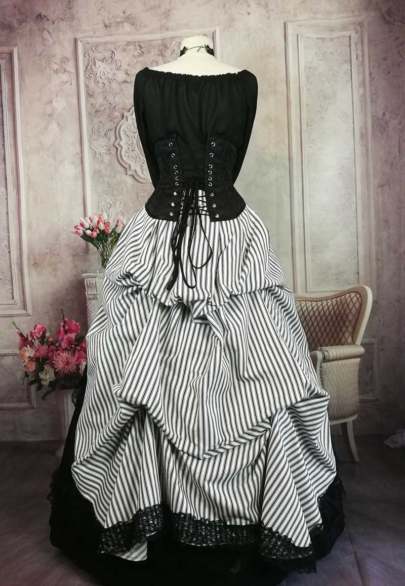 back view of the Hampstead Heath black and white striped victorian steampunk bustle skirt worn over a boned petticoat crinoline