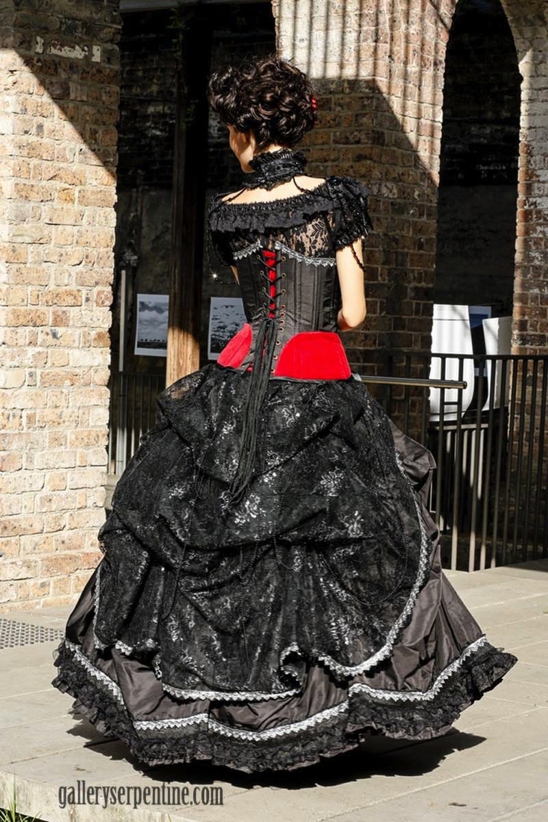 elegant black & red gothic wedding dress back view of black lace bustle
