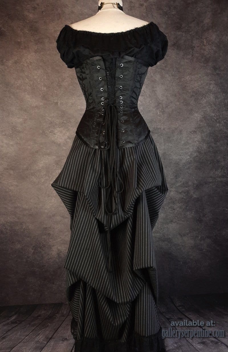 close up view of back of Venus corset and pinstripe bustle skirt