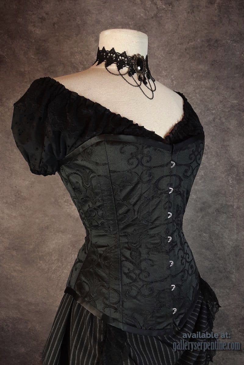 Venus over bust corset in black brocade at Gallery Serpentine