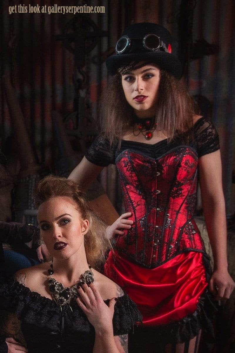indoors moody shot of the Red steampunk saloon Wild Wild West corset costume made in Australia high quality